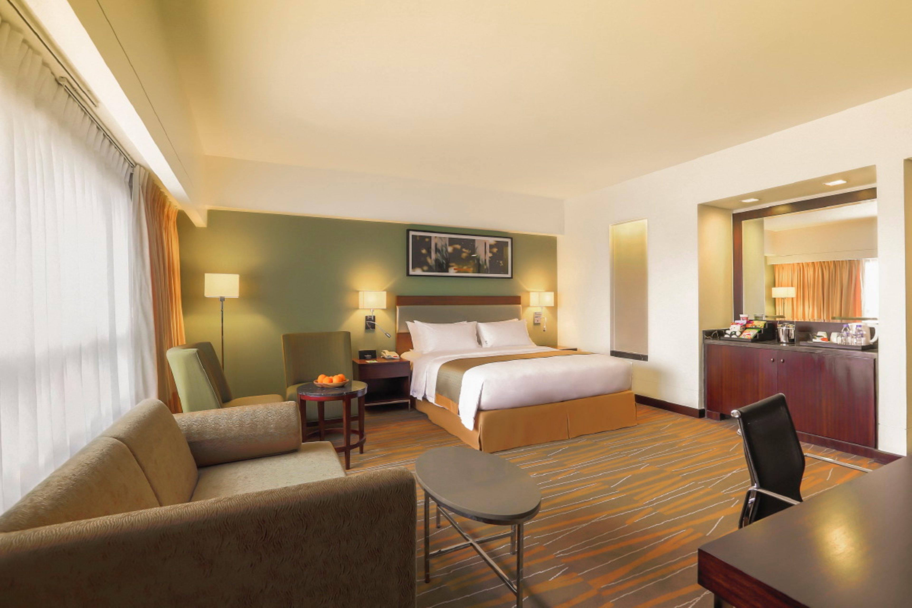 Holiday Inn & Suites Makati By Ihg Makati City Extérieur photo Suite